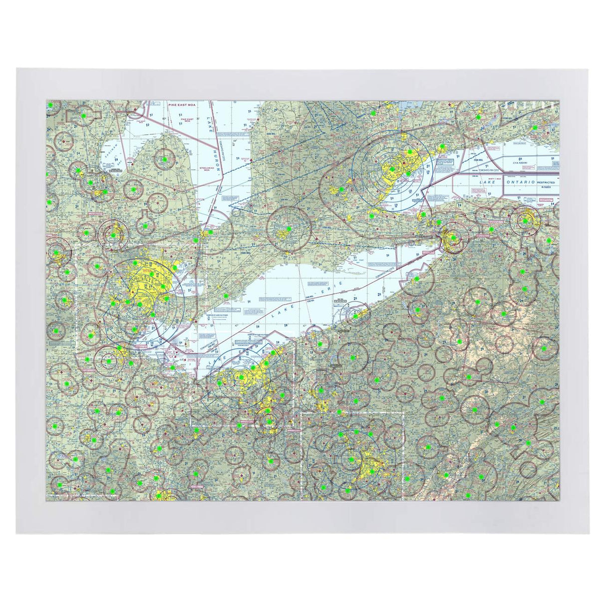 Image of the LightMap Air with white frame mounted on a wall showing live weather and METAR conditions